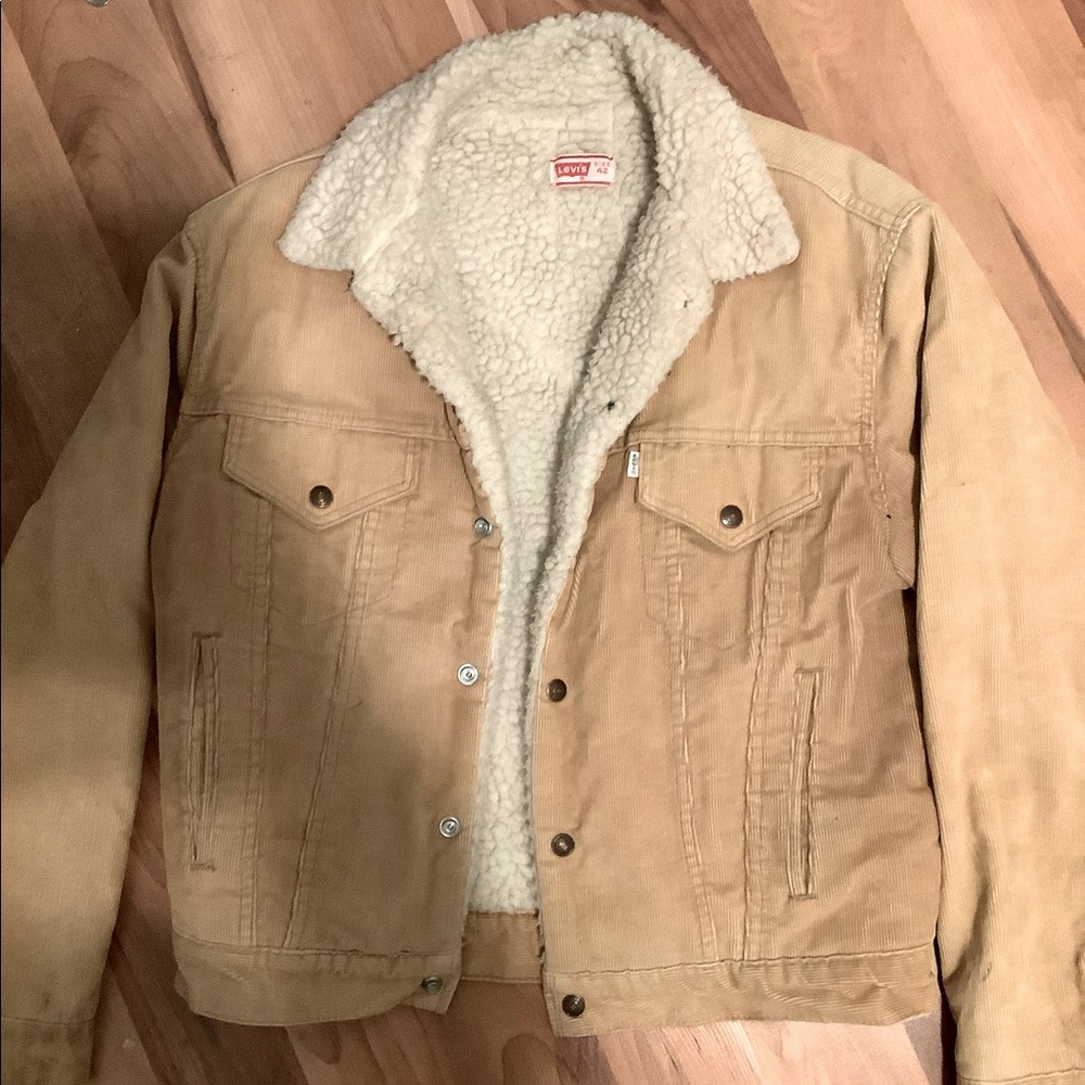 Levi’s tan corduroy, Sherpa lined jacket. Size 42- fits like Women’s Medium
